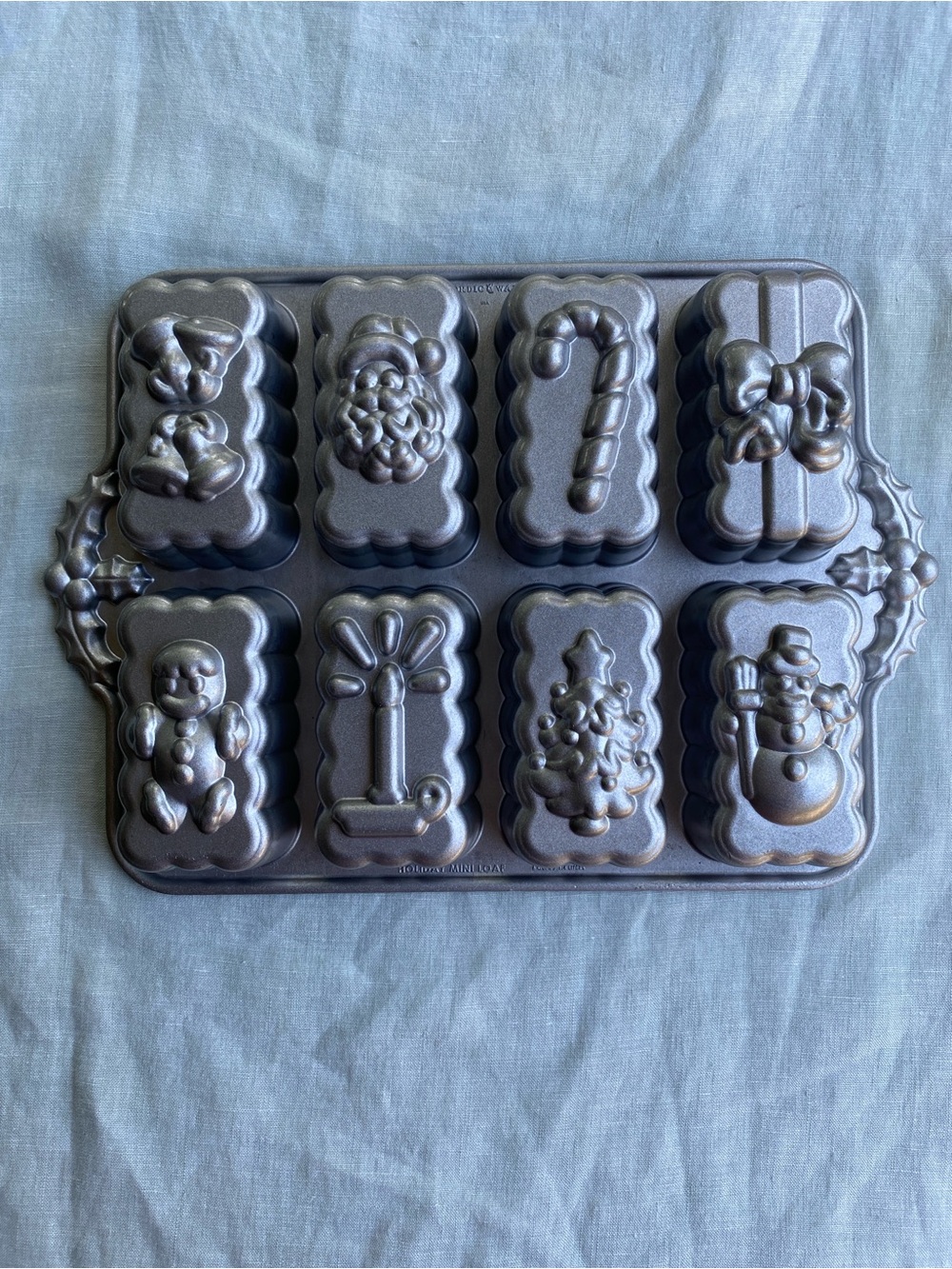 Nordic Ware 6 cup holiday mini loaf cake pan Christmas Santa candy cane present